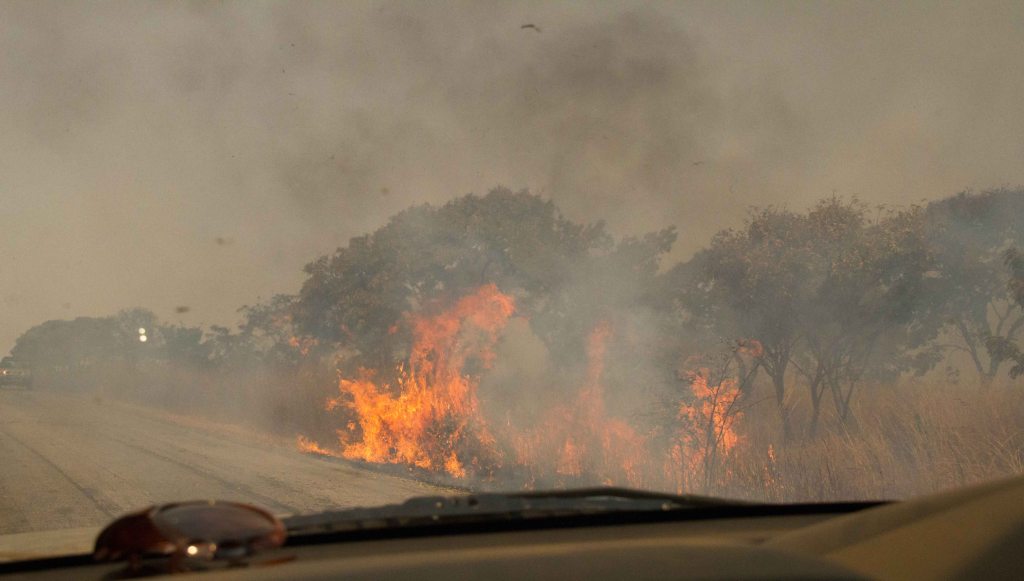 Driving throught the veld fires en-route to Antelope Park